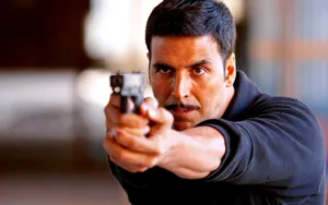 Akshay Kumar Pointing Gun Wallpaper