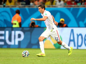 Alejandro Bedoya Kicking The Ball Wallpaper