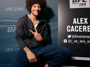 Alex Caceres Posing Peace Sign Wallpaper