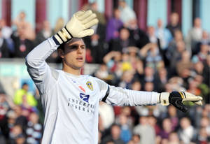 Alex Mccarthy Gesturing With Hands Wallpaper