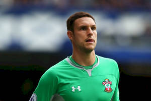 Alex Mccarthy In Green Shirt Wallpaper