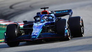 Alexander Albon Blue Formula One Car Wallpaper