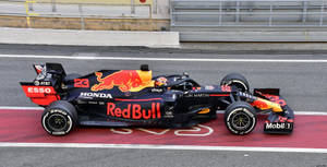 Alexander Albon Driving The Red Bull Racing Car Wallpaper