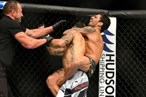 Alexandre Pantoja Cornering Opponent Wallpaper