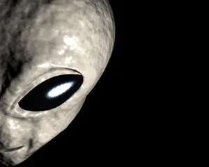 Alien In Half-mask Illuminated By Glaring Lights Wallpaper