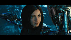 Alita Ready For Battle As She Faces Off Against Zapan In A Thrilling Showdown. Wallpaper