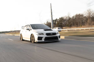 All White Speeding Subaru Wrx Sti 4k Wallpaper