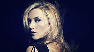 Alluring Kate Winslet Looking Back Wallpaper