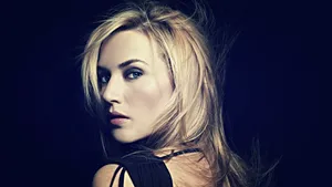 Alluring Kate Winslet Looking Back Wallpaper