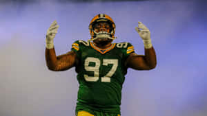American Football Defensive Tackle Kenny Clark On Smoke Wallpaper