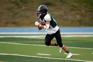 American Football Player Running Wallpaper