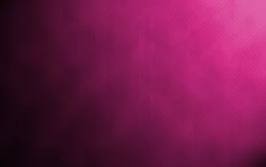 An Abstract Blur Of Dark Pink Wallpaper