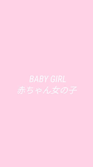 An Adorable Baby Girl All Dressed In Pink Wallpaper