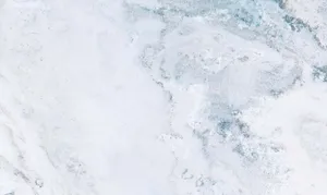 An Apple Ipad In A Marble Finish Wallpaper