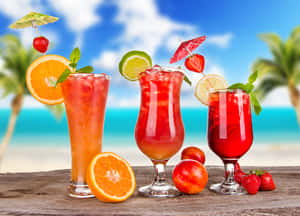 An Array Of Fresh Juices In Fancy Cocktail Glasses Wallpaper
