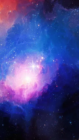 An Exotic View Of The Galaxy Against A Calming Cool Blue Sky Wallpaper