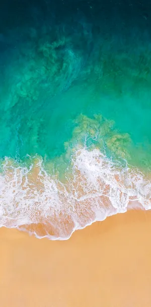 An Iphone Submerged In Water Wallpaper