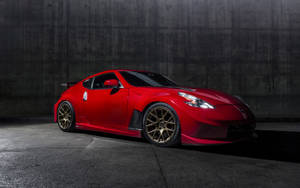 An Open View Of The Sleek Black Nissan 370z In Its Full Glory Wallpaper