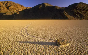 Ancient Stone Trail Winds Through The Dry Desert Of The Southwest Wallpaper