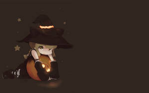 Anime Halloween Kawaii Girl Hugging Pumpkin Wallpaper