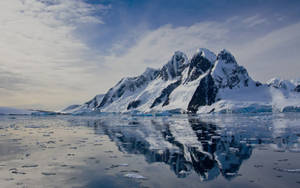 Antarctica Ice Covered Towering Mountains Wallpaper