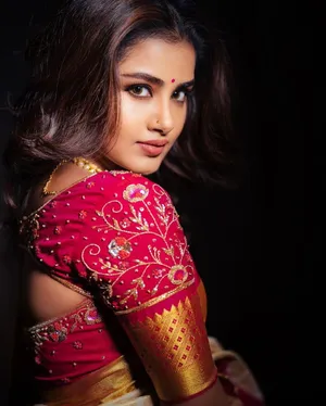 Anupama Parameswara Red Gown Wallpaper