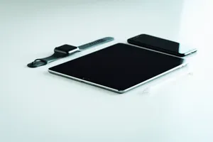 Apple Ipad Pro With Apple Products Wallpaper