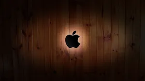 Apple Logo Crafted On Wood. Wallpaper