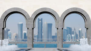 Archways Framing City In Museum Of Islamic Art Wallpaper