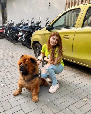 Arishfa Khan With Dog Wallpaper