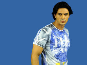Arjun Rampal On Blue Background Wallpaper