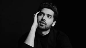 Armaan Malik Striking Monochromatic Pose Wallpaper