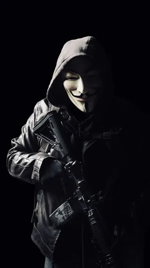 Armed Man In Black Gangster Jacket Wallpaper