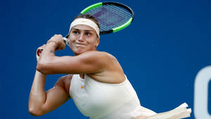 Aryna Sabalenka In Action - Tennis Power Shot Wallpaper