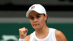 Ashleigh Barty Celebrates A Winning Moment Wallpaper