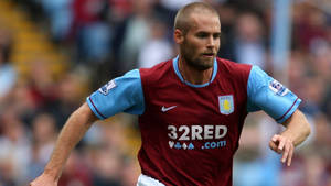 Aston Villa's Mellberg Running Wallpaper