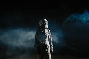 Astronaut In Space Wearing Gray Suit Wallpaper