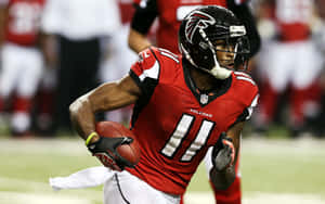 Atlanta Falcons Wide Receiver Julio Jones Powers Into The End Zone Wallpaper