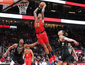 Atlanta Hawks Dunking Player Wallpaper