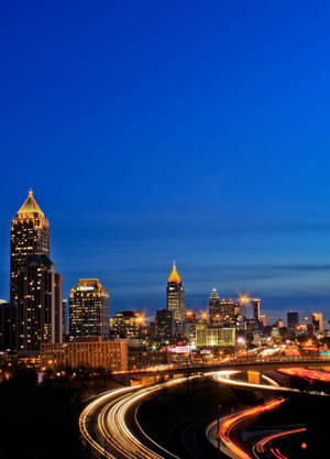 Atlanta Skyline With Yellow Trails Wallpaper