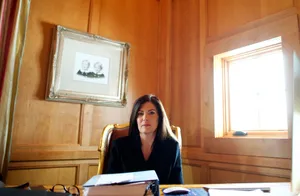 Attorney Working Hard On Client's Case Wallpaper