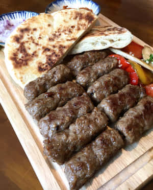 Authentic Grilled Ćevapi With Pita Bread Wallpaper