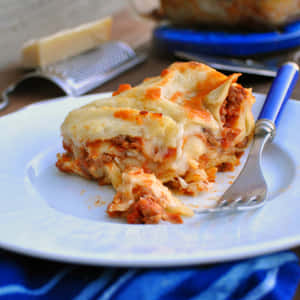 Authentic Lasagna Alla Bolognese Served Fresh Wallpaper