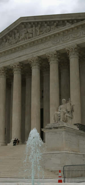 Authority Of Law Supreme Court Building Statue Wallpaper