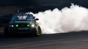 Auto Racing With Fumes Wallpaper