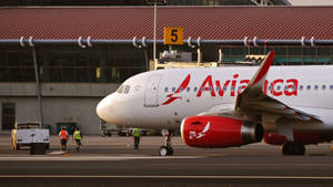 Avianca Airline Passenger Plane On Standby Wallpaper