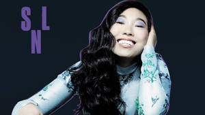 Awkwafina Photograph With Snl Letters Wallpaper