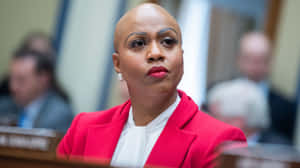 Ayanna Pressley - Empowered And Eloquent In Red Wallpaper