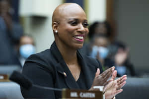 Ayanna Pressley Happily Clapping Hands Wallpaper