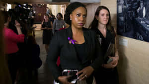 Ayanna Pressley Walking With Staff Members Wallpaper